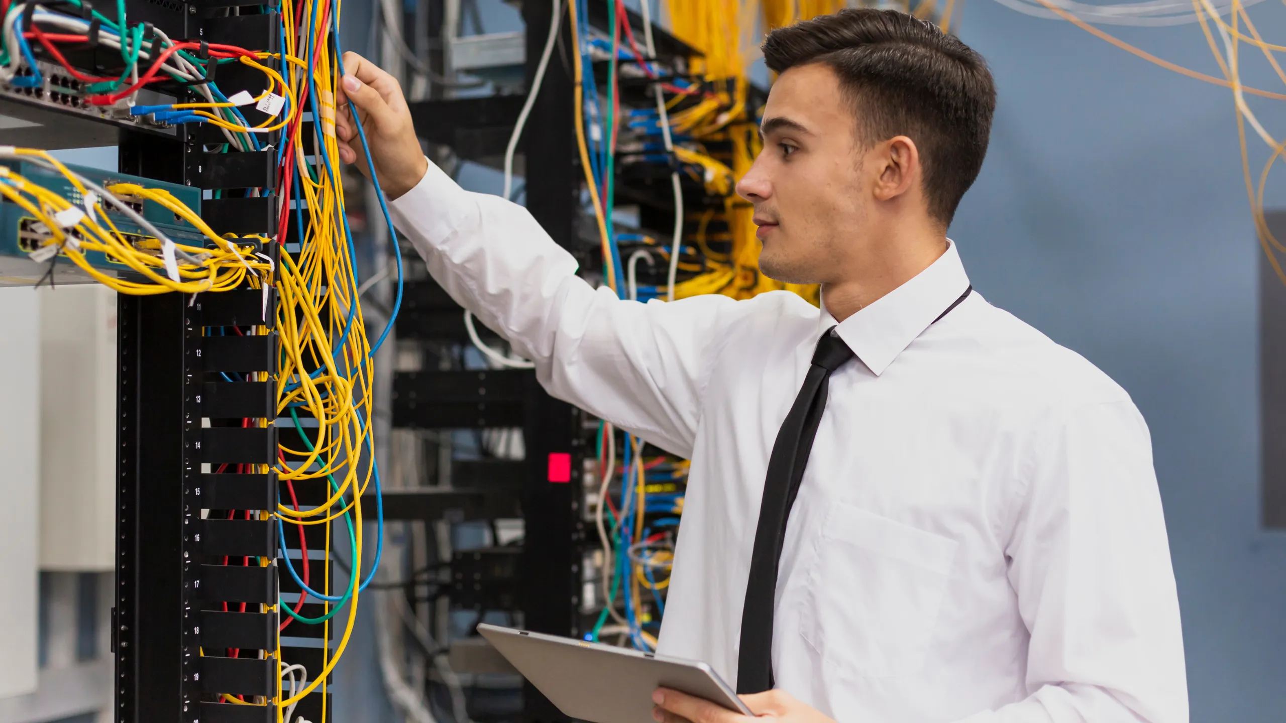 IT professional reviewing network servers as part of Managed IT Services Melbourne