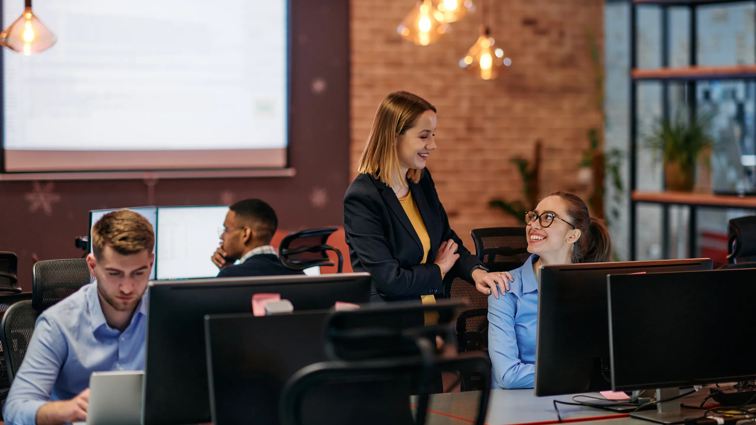 Managed IT support team delivering Essential 8 cybersecurity and IT support services for businesses